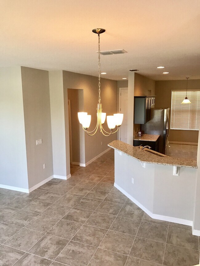 Building Photo - MOVE IN SPECIAL- 3/2.5 Beautiful Energy Efficient Townhome in St. Cloud