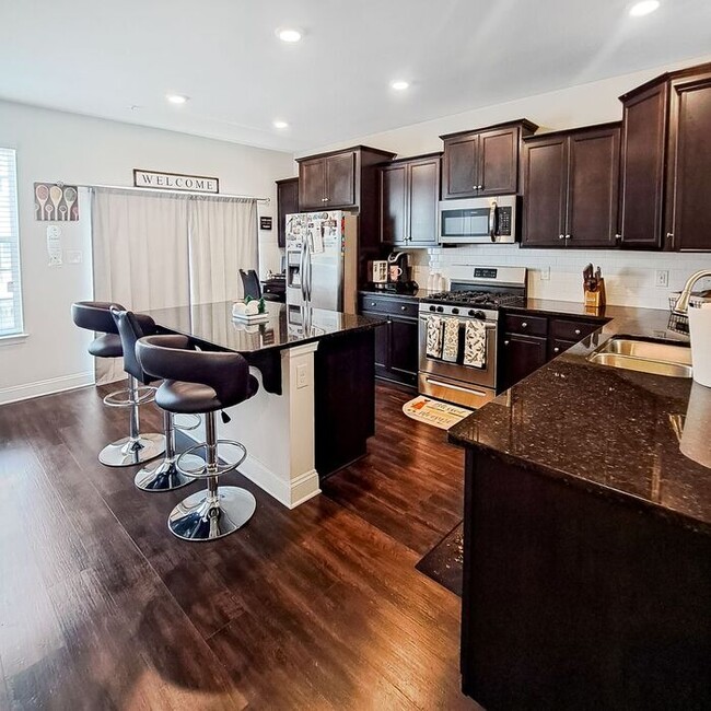 Building Photo - Gorgeous 3-Level End Unit Townhome, 3 Bedr...