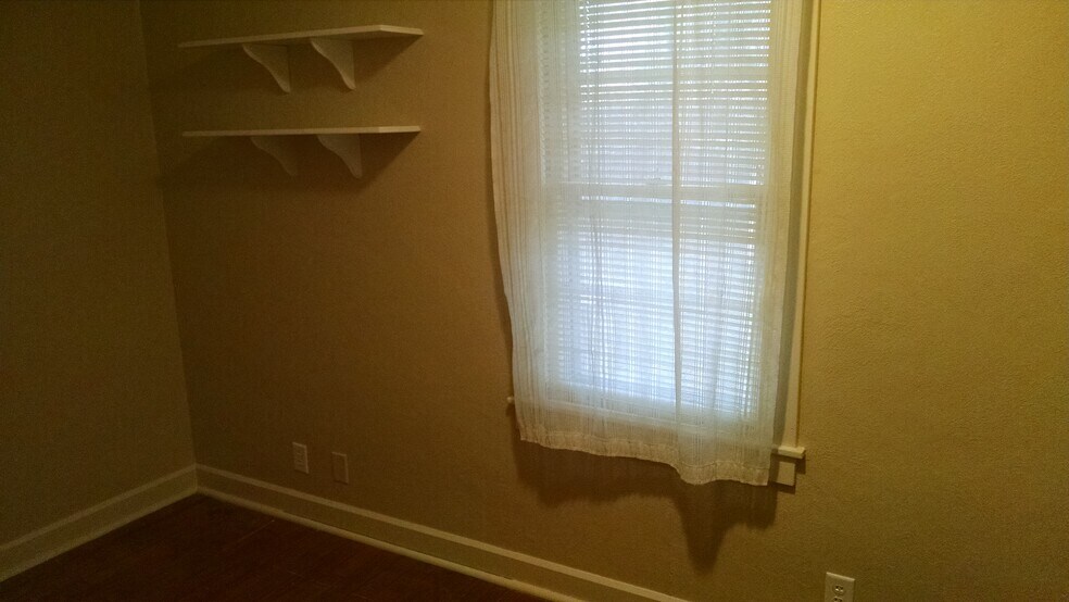 Bedroom. - 1201 N Madison St