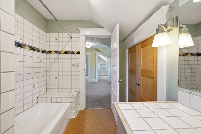 Building Photo - Timeless Grant Park Craftsman with Modern Comforts
