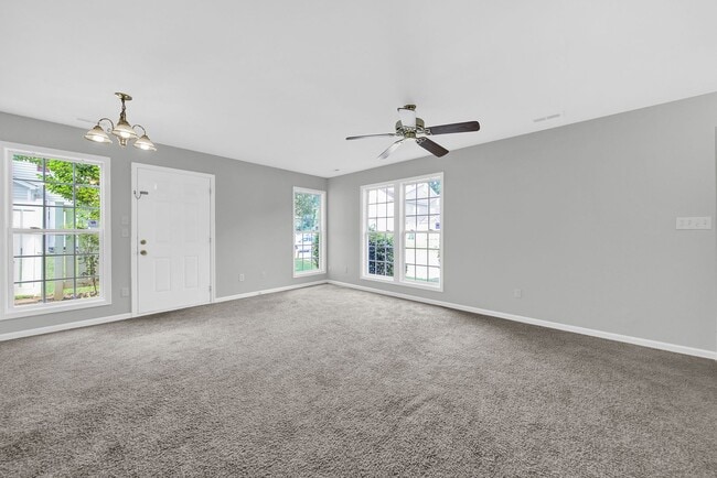 Building Photo - Two-story Condominium with Easy Highway Ac...