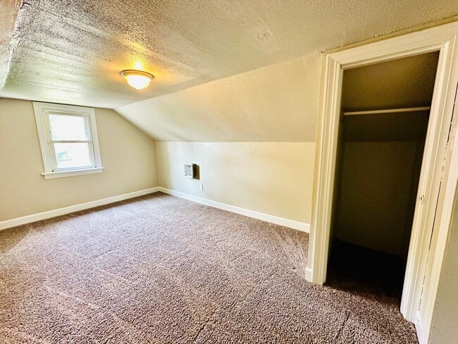 Building Photo - Updated two story home with unfinished bas...