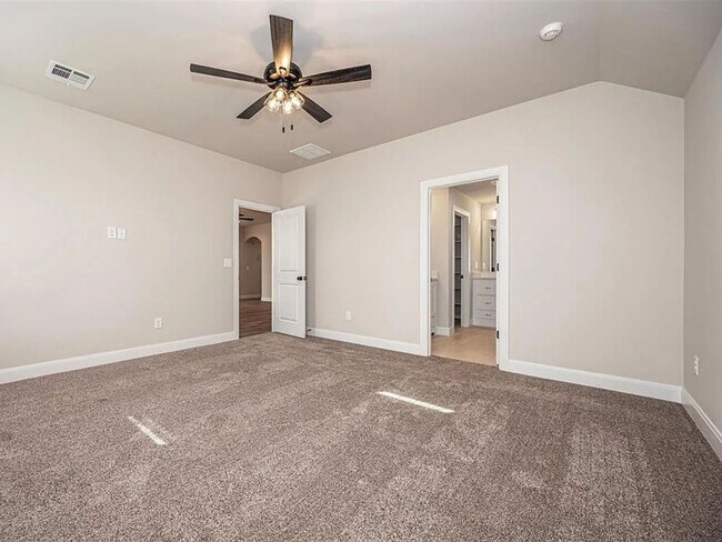 Building Photo - 4-Bed Home with Storm Shelter & 2-Car Garage in Mustang