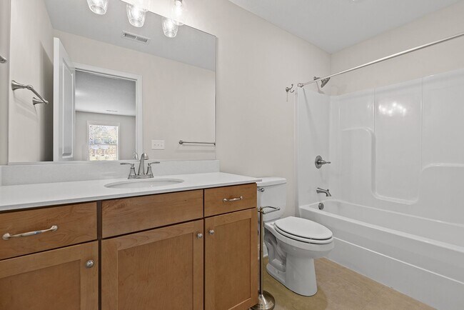 Building Photo - MAINTENANCE FREE, LUXURY TOWNHOME IN FARRA...