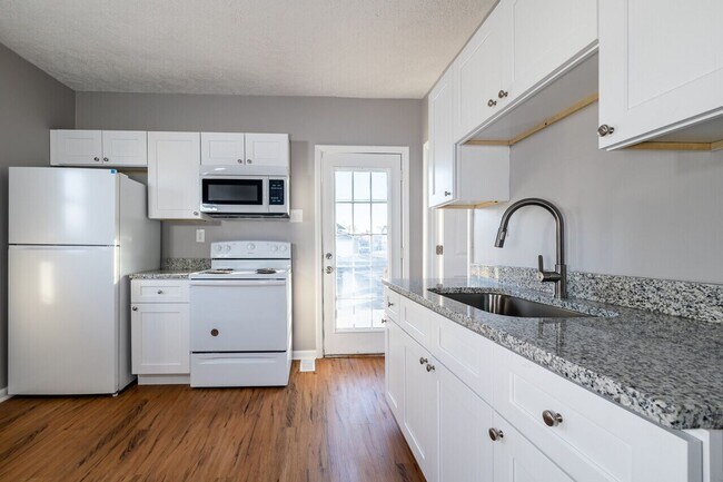 Building Photo - Charming & Cozy West End Cottage – Steps from Roosevelt Elementary & Parks