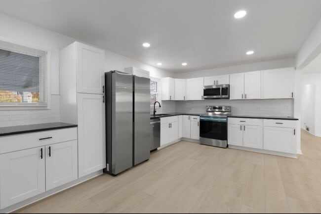 Building Photo - For Rent – Beautifully Renovated 4 Bedroom, 2 Bath Home