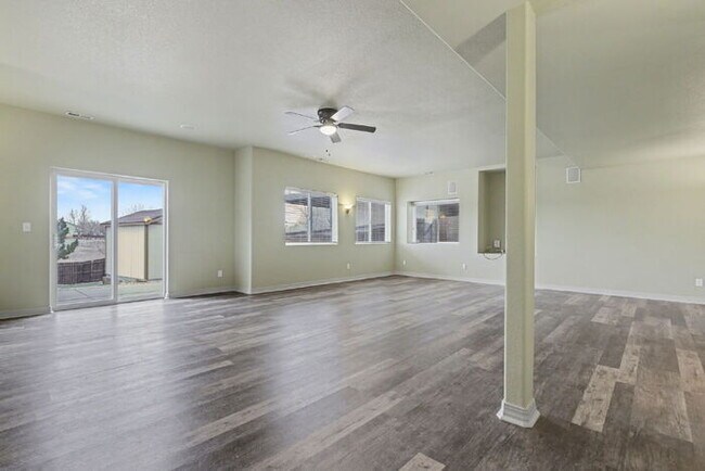 Building Photo - Spacious 5-Bedroom Home Backing to Open Space with Mountain Views