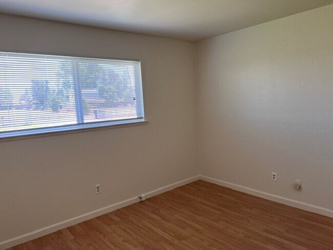 Building Photo - Freshly painted 4 bedroom home on over 2 acres of land.