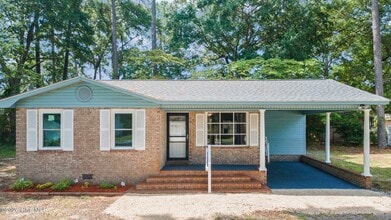 Building Photo - 1070 River Dr SW