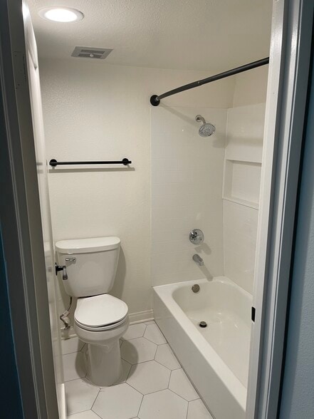 Primary toilet and shower - 5525 Canoga Ave