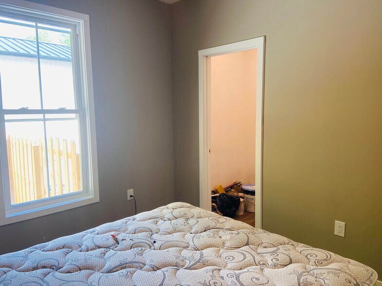 Bedroom 1 with Walk in closet - 900 Adams Rd