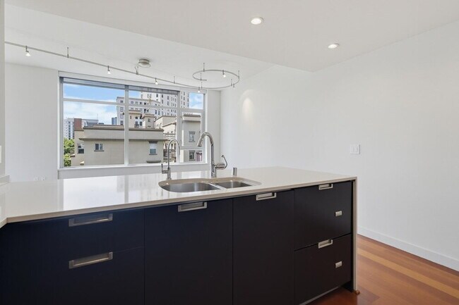 Building Photo - Skyline Views & Sophisticated Corner Living at Aria in Cortez Hill
