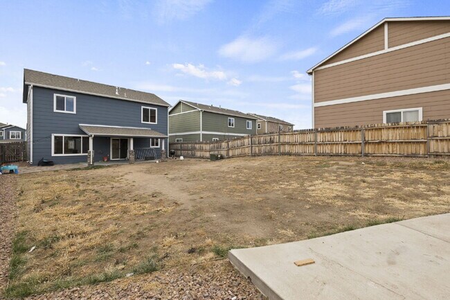 Building Photo - Spacious 4-Bedroom Home with Loft, Solar & Fenced Backyard
