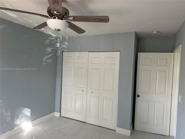 Building Photo - 7653 Tamarac Island Cir