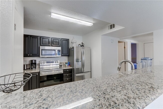 Building Photo - 5055 W Hacienda Ave