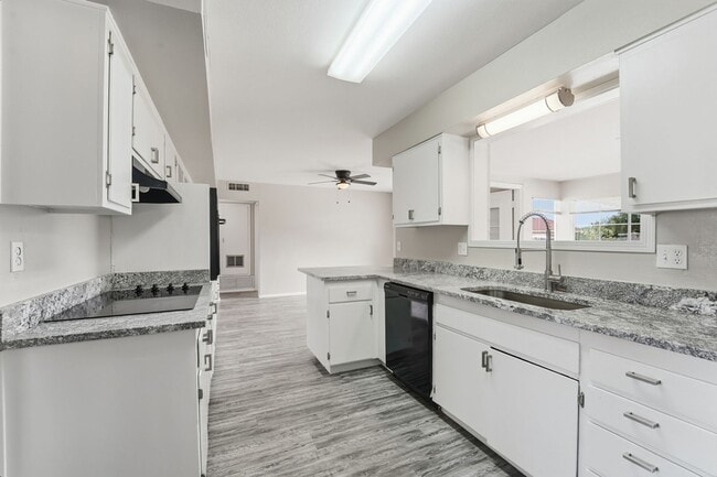 Building Photo - Comfortable 2-Bed Sun City Retreat with Vinyl Flooring & Fresh Paint