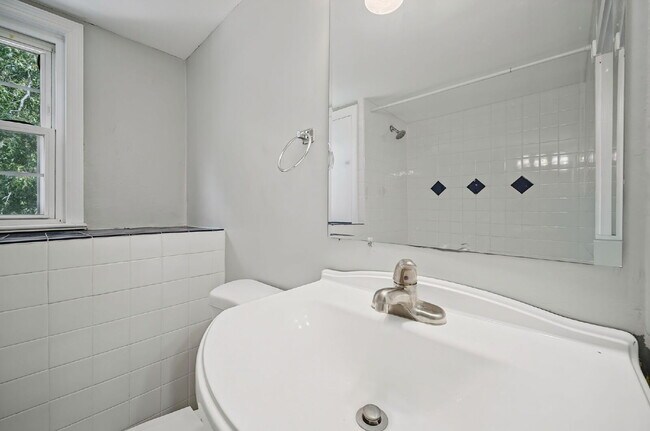 Building Photo - RARE FIND-4 BEDROOMS, 2 BATHROOMS, FENCED BACK YARD and GARAGE-PETS!!