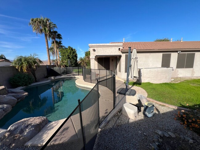 Building Photo - Charming home with a private fenced pool i...