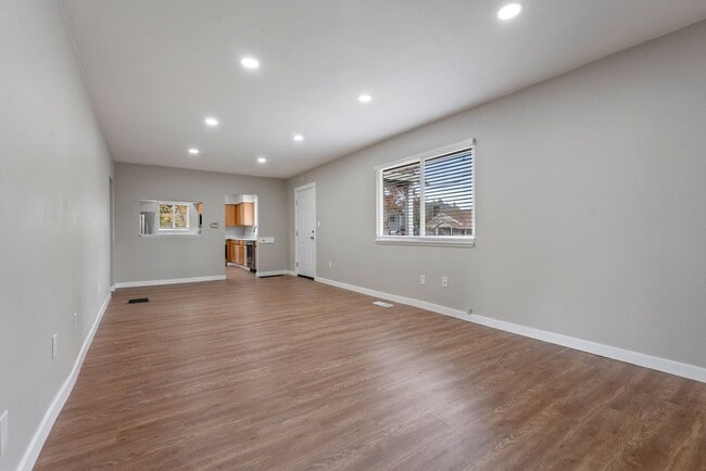 Building Photo - Spacious 5-bed, 2.5-bath home available in...