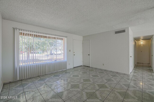 Building Photo - 3020 N 87th Ave
