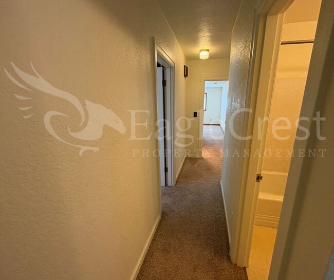 Building Photo - Three Bedroom, Two Bathroom House with Fenced Yard and Outdoor Fireplace