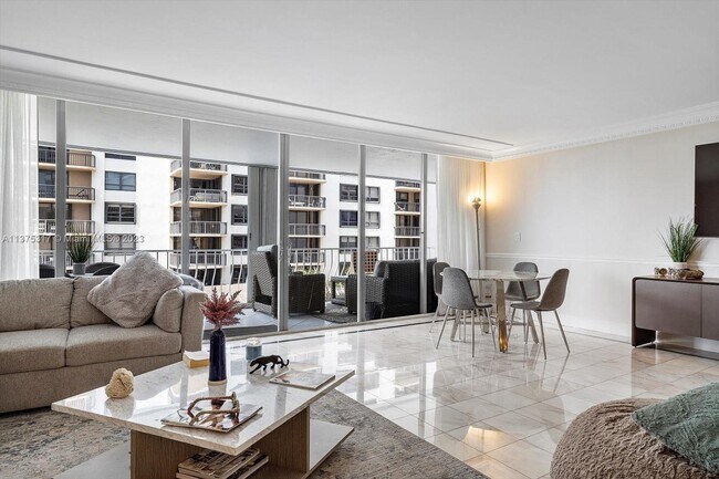 Building Photo - 10155 Collins Ave