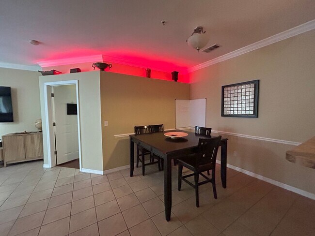 Building Photo - Walk to UF! Spacious & Furnished 3BD Condo...