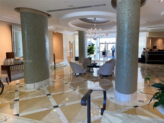 Building Photo - 6917 Collins Ave