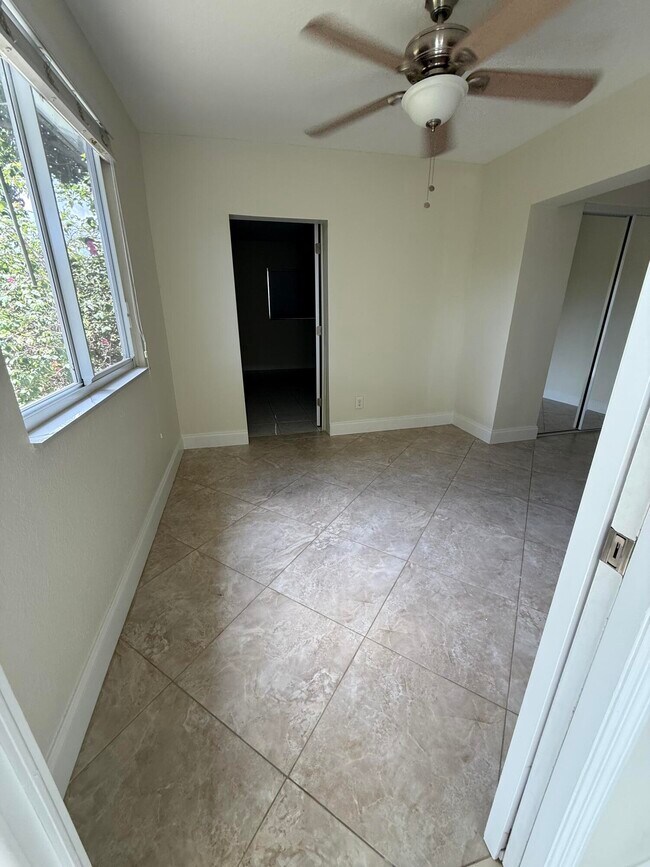 Building Photo - 6388 Whispering Wind Way