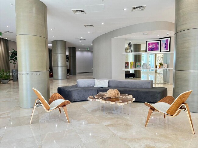 Building Photo - 10275 Collins Ave