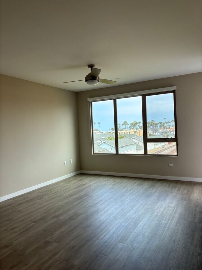 Building Photo - Live the Coastal Life- 2BR/2BA Condo Just ...