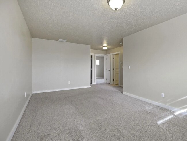 Building Photo - Spacious 4-Bedroom Home with 3-Car Garage