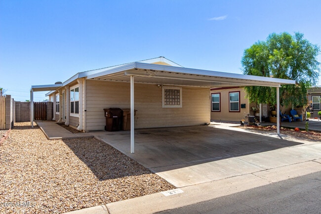 Building Photo - 8601 N 103rd Ave