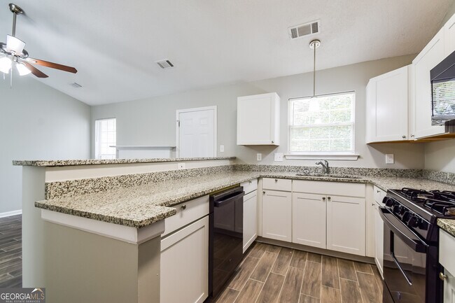 Building Photo - 9407 Rollinghills Dr