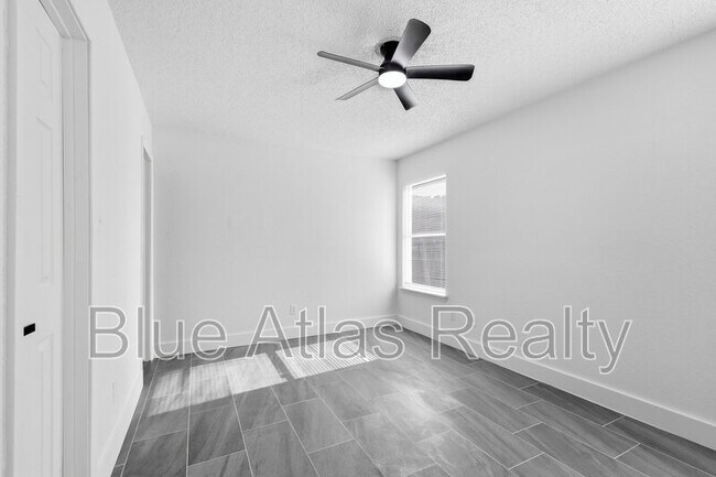 Building Photo - 7124 Wagonwheel Rd
