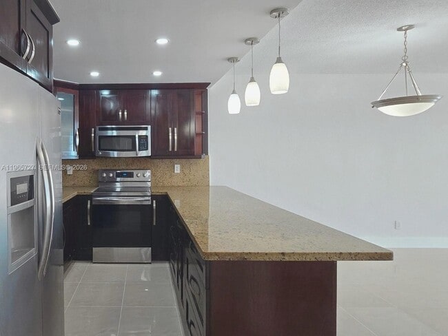 Building Photo - 19380 Collins Ave