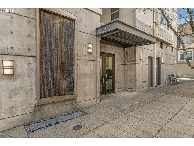 Building Photo - Main Street Living with Granite Kitchen, Gas Fireplace, and MAX Line Access