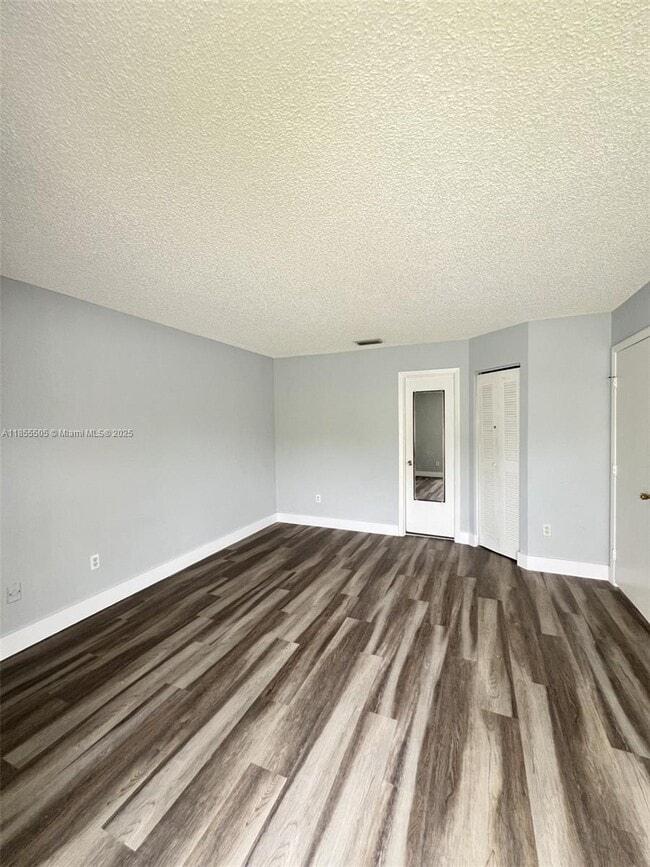 Building Photo - 10155 Boca Bend E