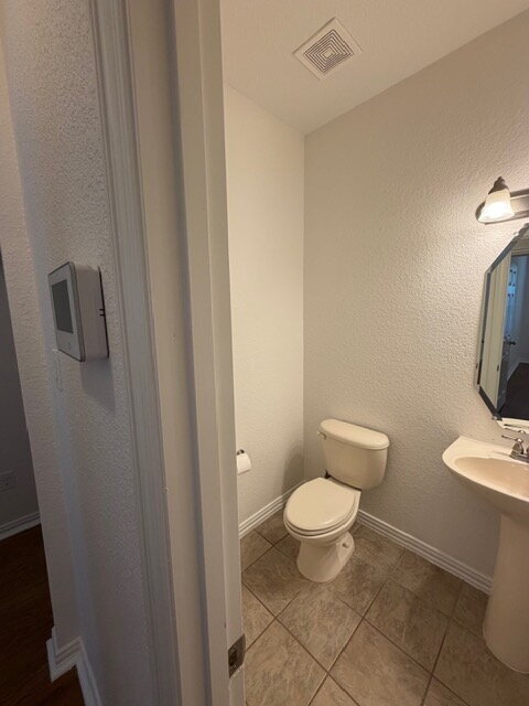 Building Photo - Former model home on corner lot is ready for move in!