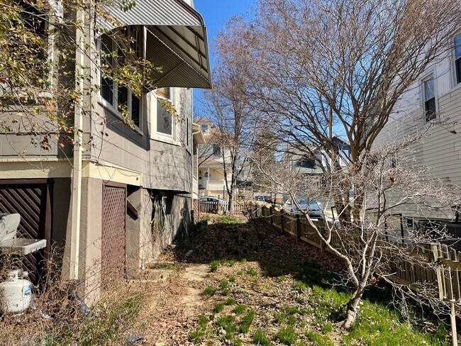 Building Photo - Lauraville 4-Bedroom, 2-Bathroom American Foursquare Home with Beautiful Outdoor Space