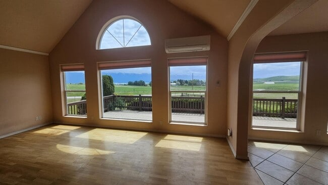 Building Photo - Out of town house with double garage and l...