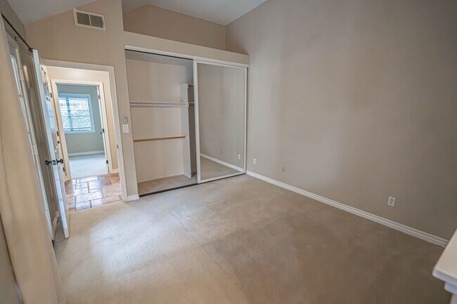 Building Photo - COMING SOON! Charming 2-Bedroom Home with a Versatile Loft in The Bungalows of Valencia!