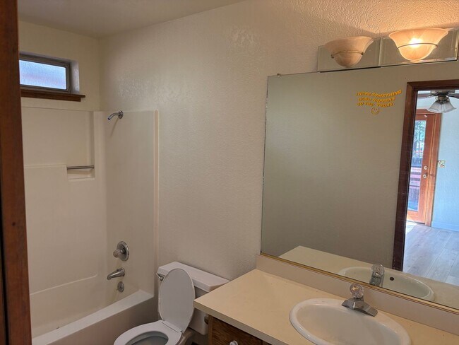 Building Photo - One level cabin with fenced backyard and garage