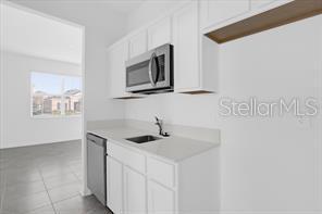 Building Photo - 4385 Pebbles Throw Dr