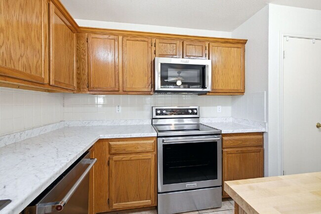 Building Photo - 4 Bedroom home with ZERO carpet close to RAFB