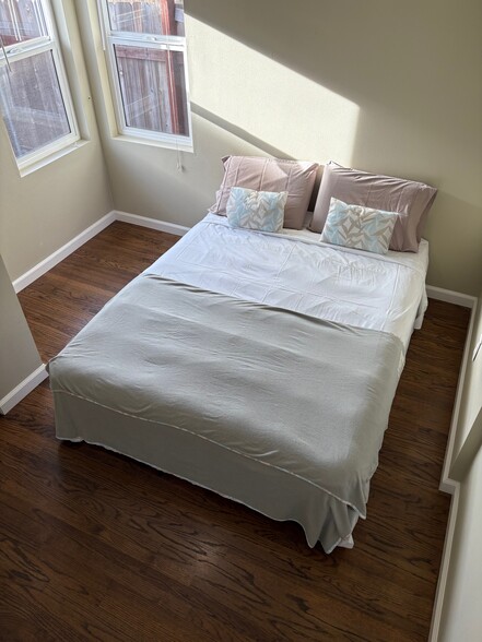 Bedroom #1 with queen bed and windows facing north and west - 4410 36th St