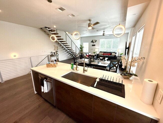 Building Photo - AVAILABLE NOW! Jaw Dropping 3 Story 3 Bedr...