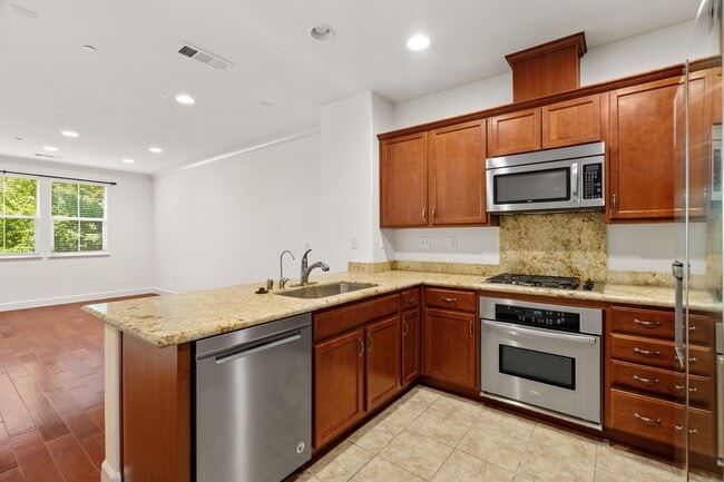 Building Photo - ELEGANTLY APPOINTED TOWNHOME IN TOSCANA PRIVATE & SECURE | NEAR GREENBELT!