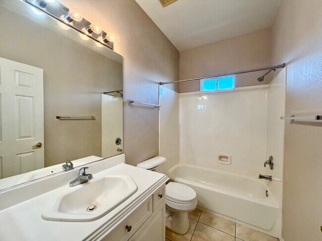 Building Photo - GATED SUMMERLIN HOME | 5 BEDROOM + DOWNSTAIRS DEN | 3-CAR GARAGE