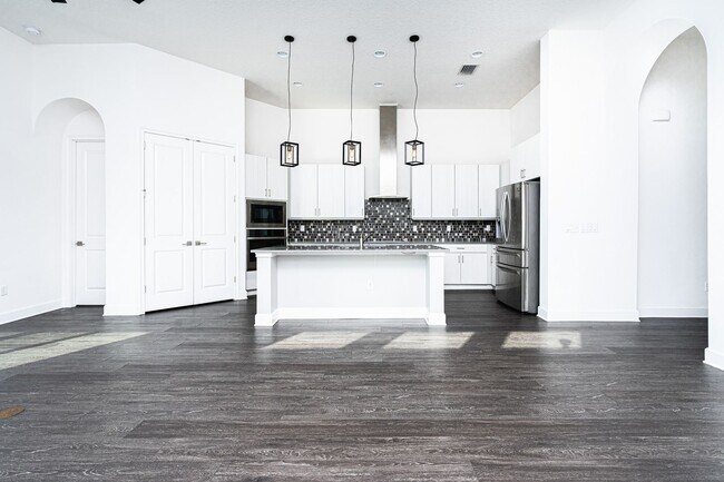 Building Photo - Luxurious Solar Powered 4 Bedroom, 3 Bath Waterfront Home with office & Upgrades Galore!